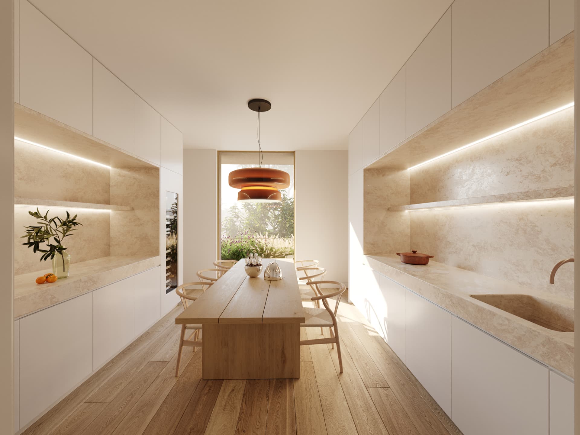 Kitchen and dining space in oak and travertine with a long timber table.
