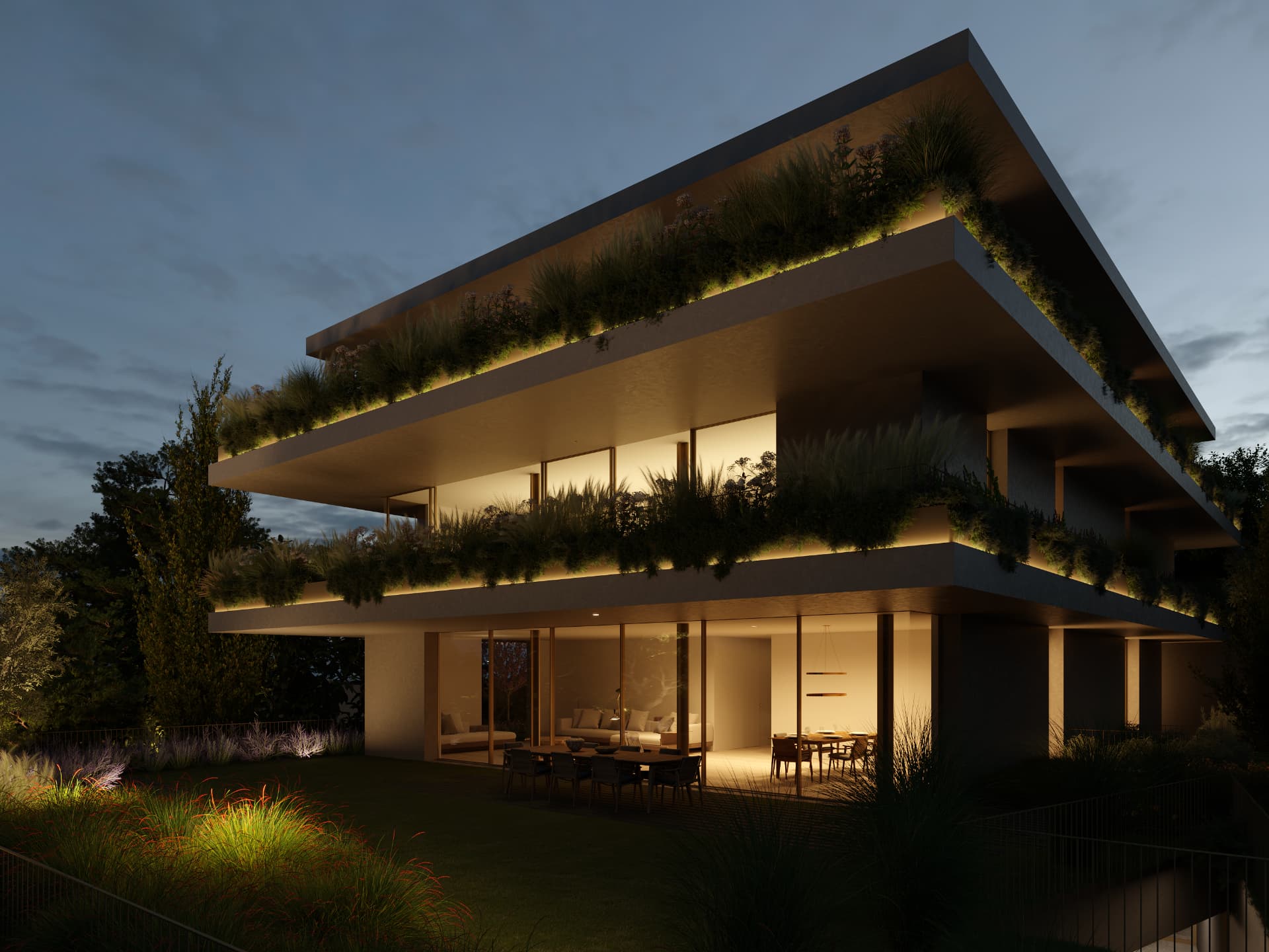 San Remo at dusk, terraces lit and planted balconies glowing.